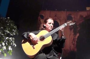 Celia Morales entertains with her flamenco guitar